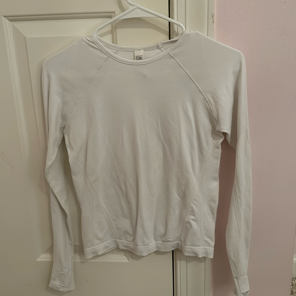 Athletic girl, white long sleeve size medium, 8 to 10